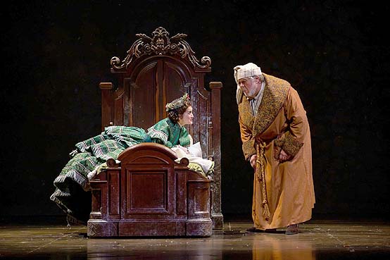 Andrea Goss (Christmas Present) and Joel McKinnon Miller (Ebenezer Scrooge) in McCarter Theatre Center's "A Christmas Carol"  Photo by T. Charles Erickson